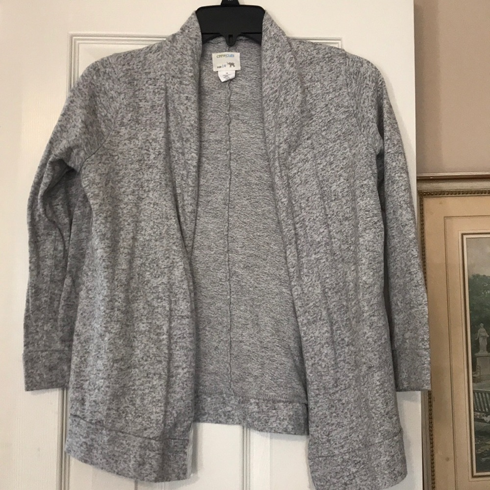 Girl’s gray sweater